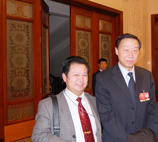 与江苏省省委书记罗志军合影